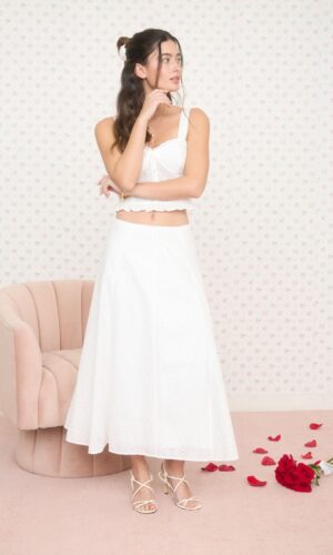 Falda midi con patrón de ojales