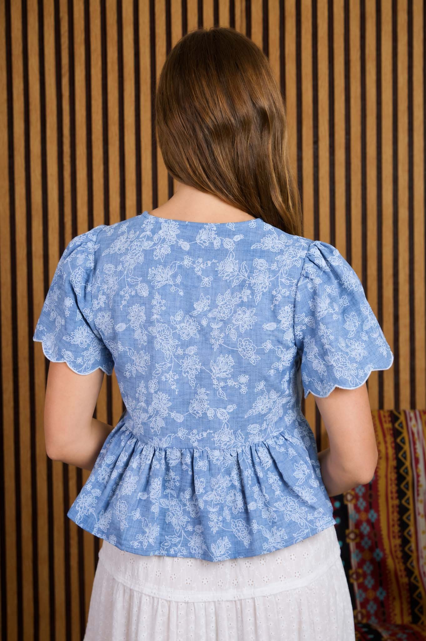 Blusa Peplum Con Bordado Floral Y Lazo Frontal - Imagen 2
